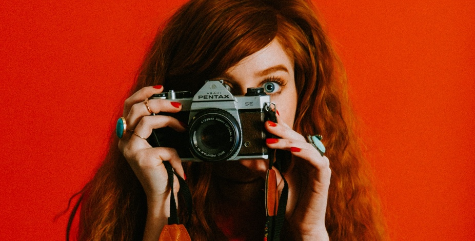 woman holding camera